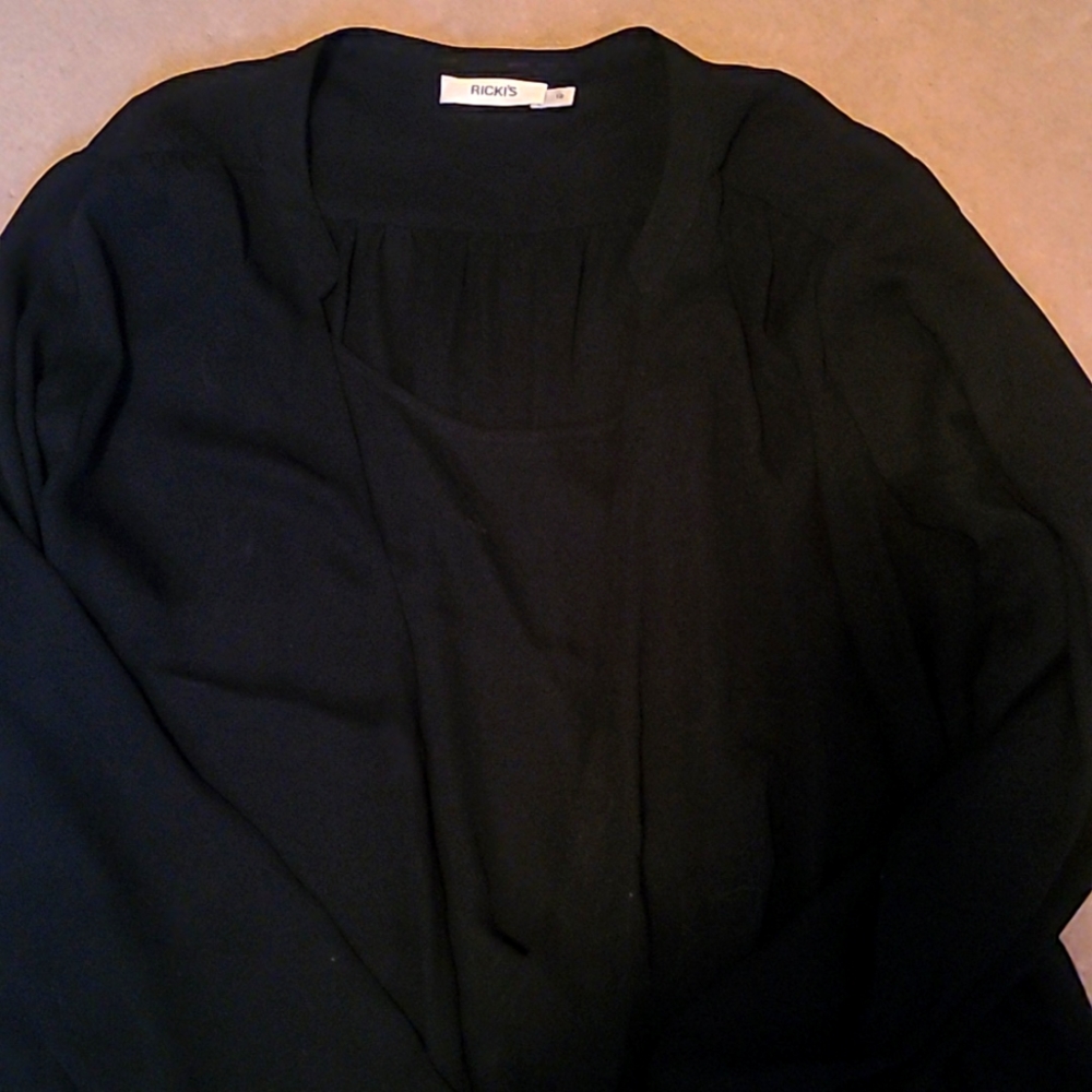 Ricki's black pullover blouse, size 12, like new.
